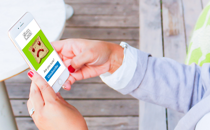 Why People Unsubscribe & What You Can Do About It | mobile phone | woman's hands