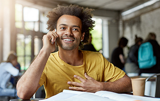 Voice Broadcasting case studies from Everlytic | Image of man on phone