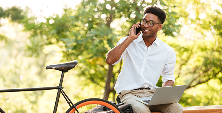 12 Tips to Create a Voice Broadcast | Everlytic | Digital communication software | Email marketing | Businessman working outside | Businessman with bicycle