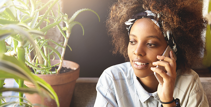 12 Tips to Create a Voice Broadcast | Everlytic | Digital communication software | Email marketing | Young woman on phone | African woman on phone