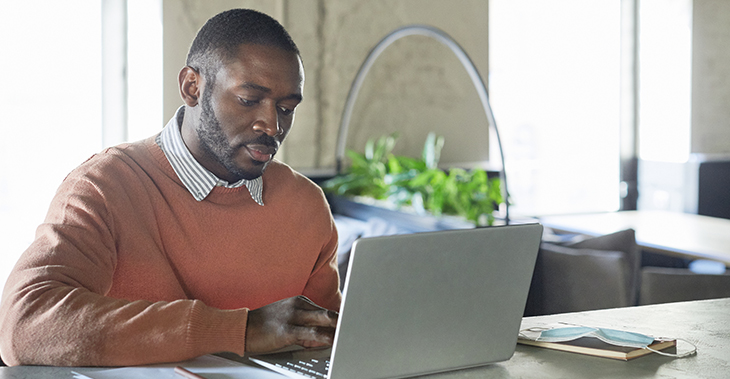 Everlytic How to Communicate with Different Generations via Email | Middle aged man working on laptop | Email Blog