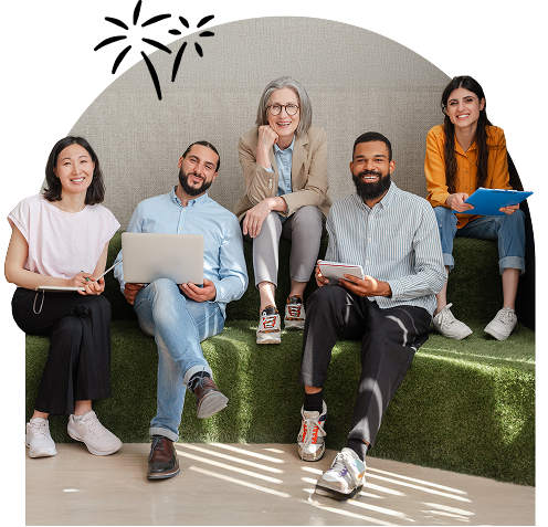 group of email marketing professionals smiling and sitting for a portrait