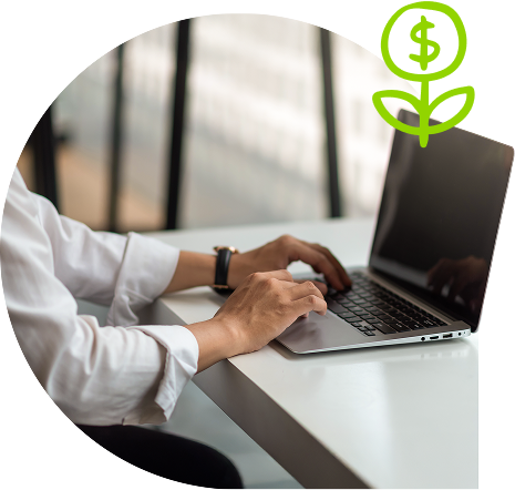 a person working on a computer and on top of the image is a flower icon with a dollar sign