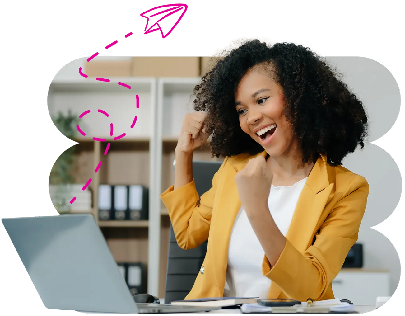 A lady looking at her laptop smiling.