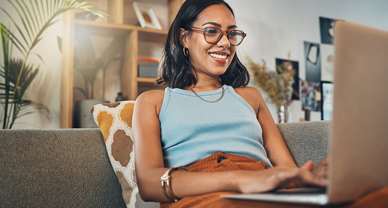 3 Ways to Supercharge Your Email Personalisation with List Segmentation_Everlytic Blog_Happy Recipient Behind a Laptop