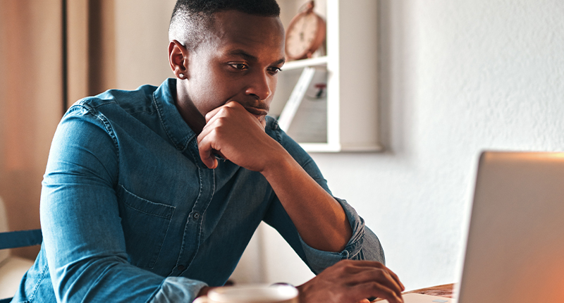 3 Steps to Maximising Your Mandela Day Emails_Everlytic Blog_Guy Focusing on Laptop