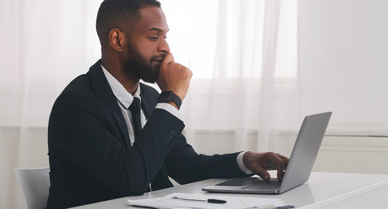 Is Marketing Automation Worth the Effort? Studies Say Absolutely! | Email marketing | Everlytic | Businessman working at laptop