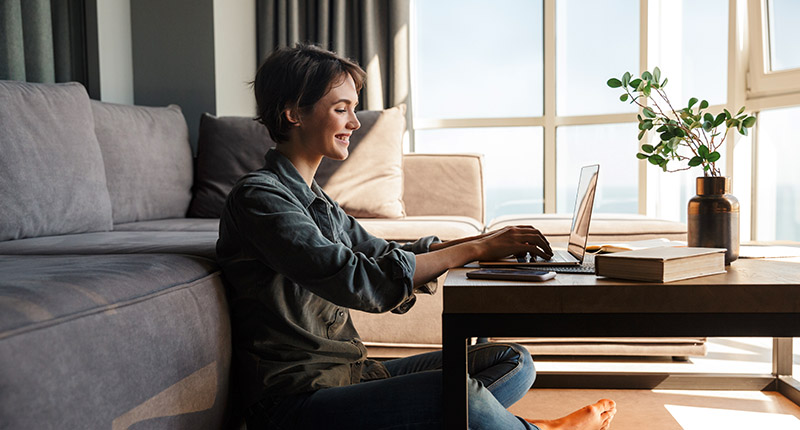 Is Marketing Automation Worth the Effort? Studies Say Absolutely! | Email marketing | Everlytic | Woman at home working on a laptop